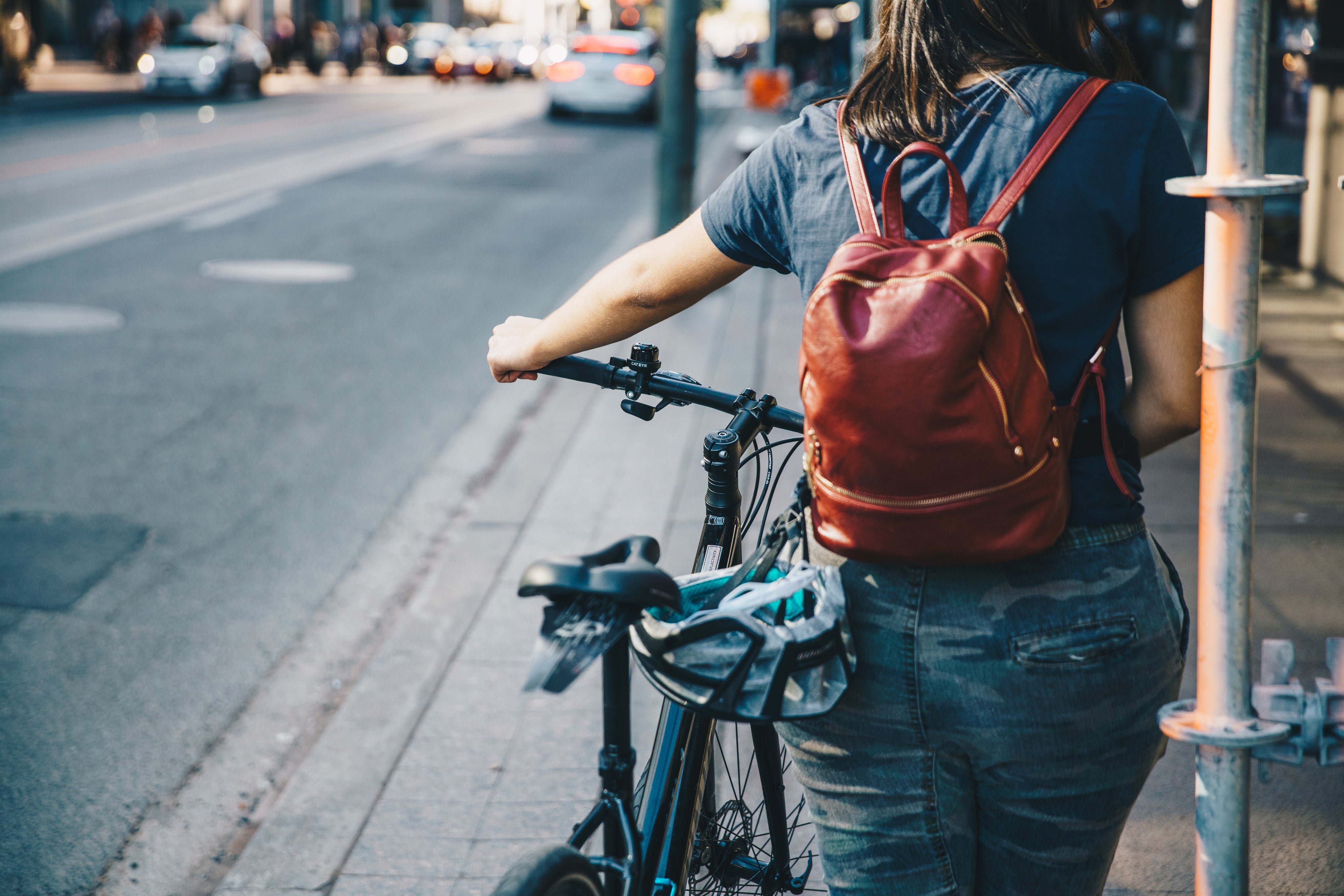 files/person-walking-bike-on-sidewalk.jpg