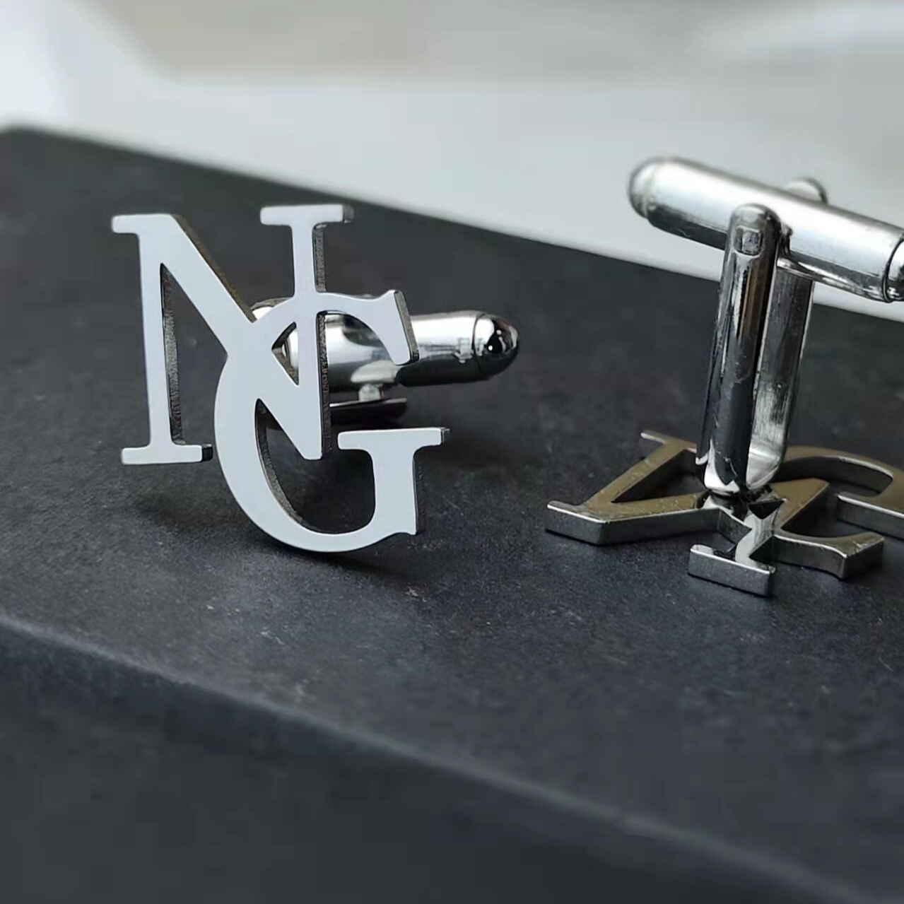Boutons de manchette initiales